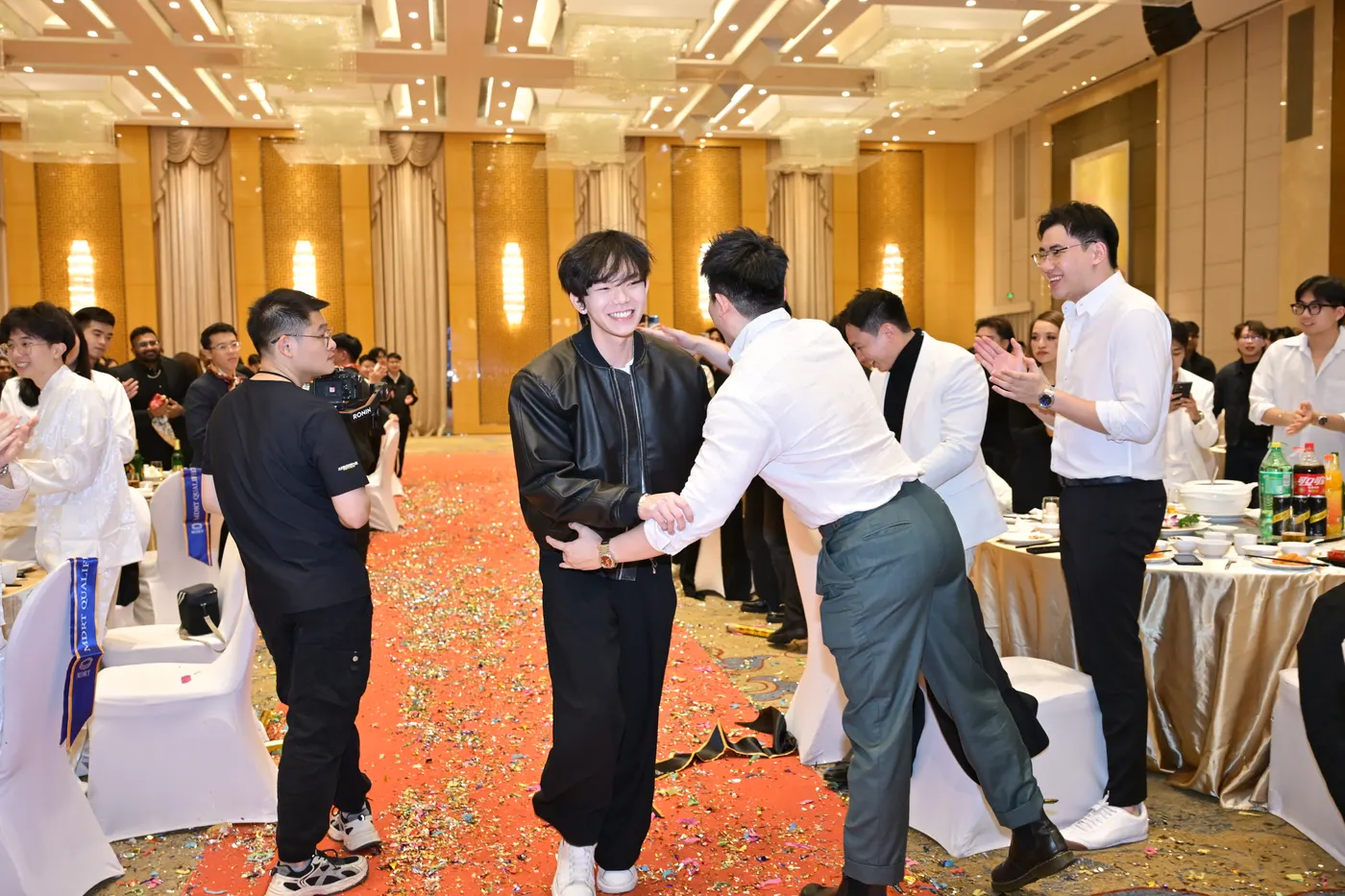 Post-celebration handshakes with the team